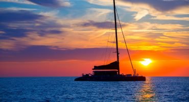 Ibiza san Antonio Abad catamaran sailboat sunset